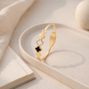Gilded Clover Trio Hinge Bangle