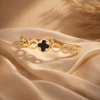 The Midnight Quatrefoil Orbital Bangle
