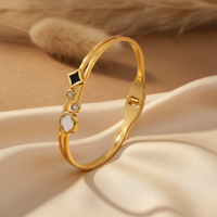 The Geometric Harmony Diamond & Onyx Bangle